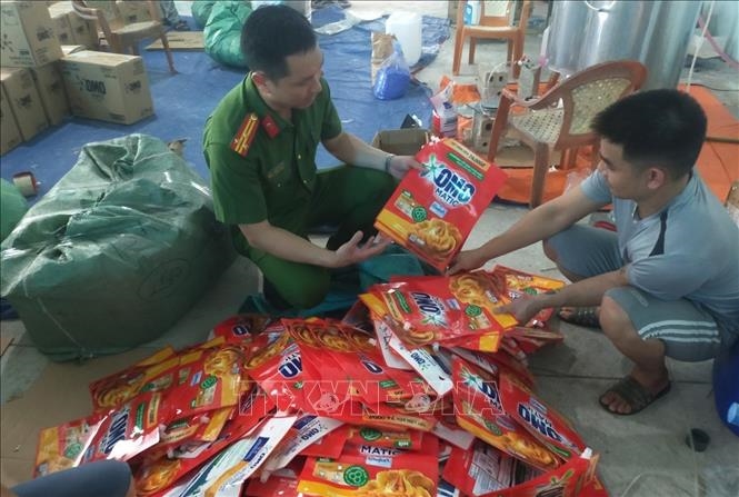 vna_potal_thanh_hoa_bat_qua_tang_2_co_so_chuyen_san_xuat_phan_phoi_ban_cac_loai_san_pham_nuoc_giat_gia_thuong_hieu_omo_stand-20250524060458-wqtbh